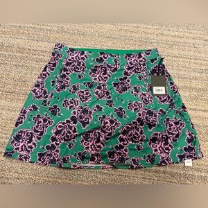 NWT G/FORE Stamped Floral Green and Purple Tech Jersey Womens Skort Large Golf